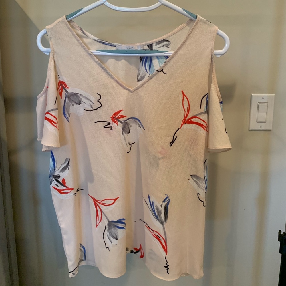 Loose, floral shirt